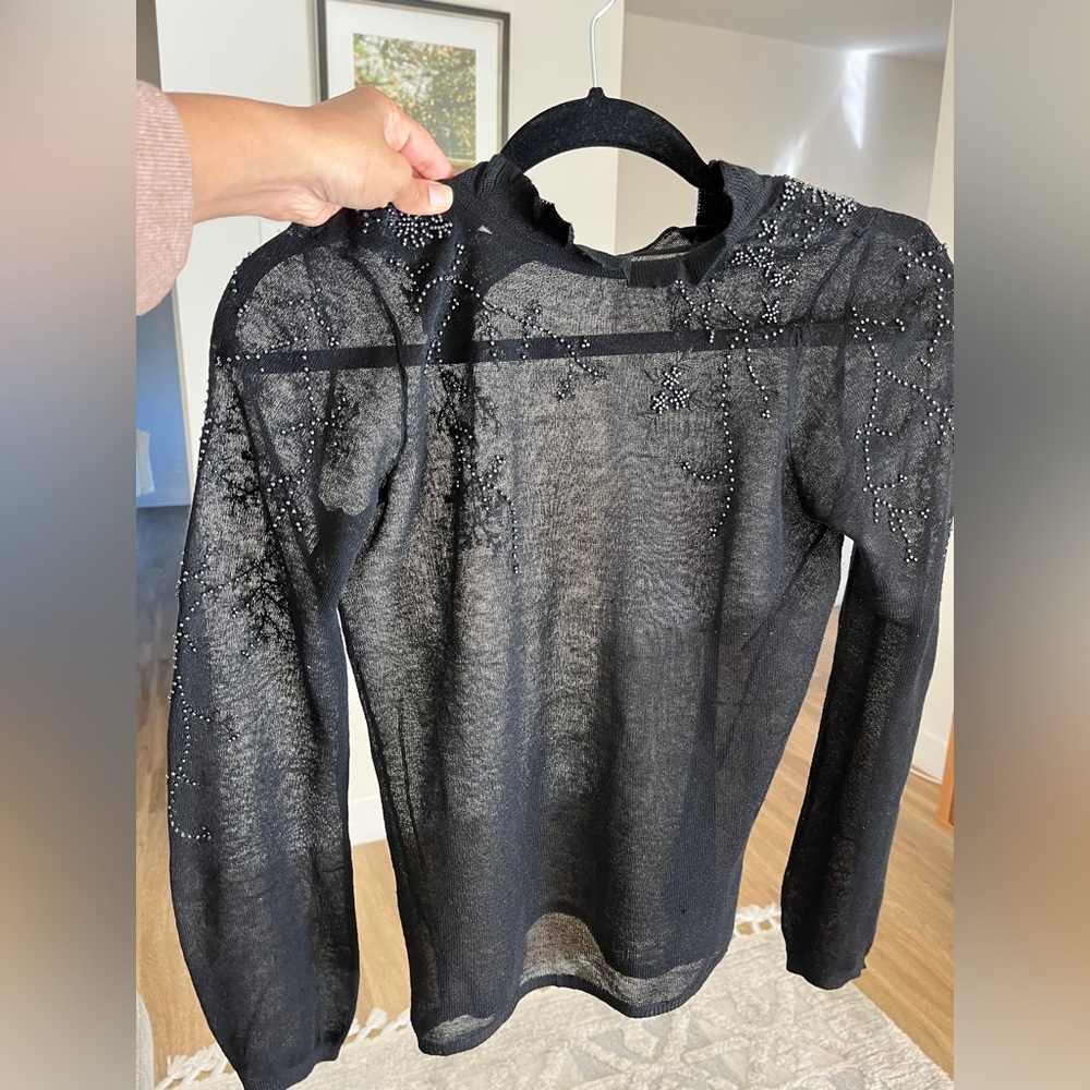 Black sheer sweater with beading work and high collar